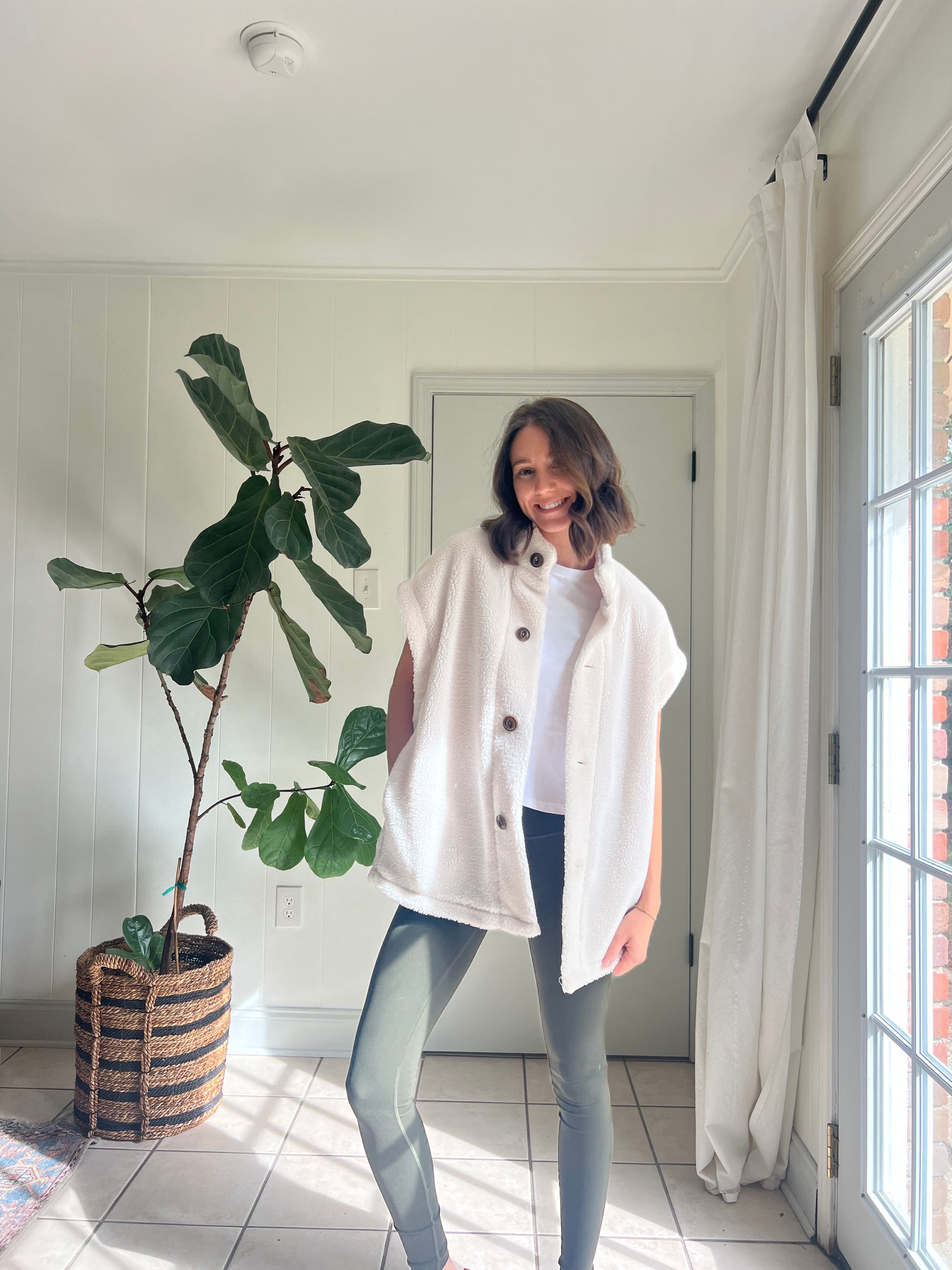 women's white sherpa vest with buttons